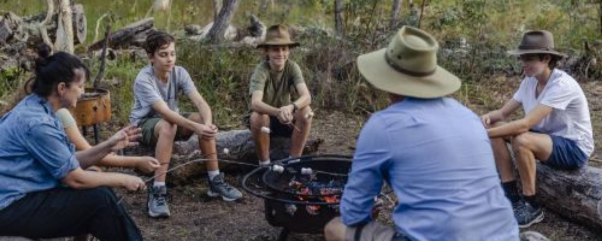 Traveller's Rest 1770 Eco Camping Group around camp fire exploring nature