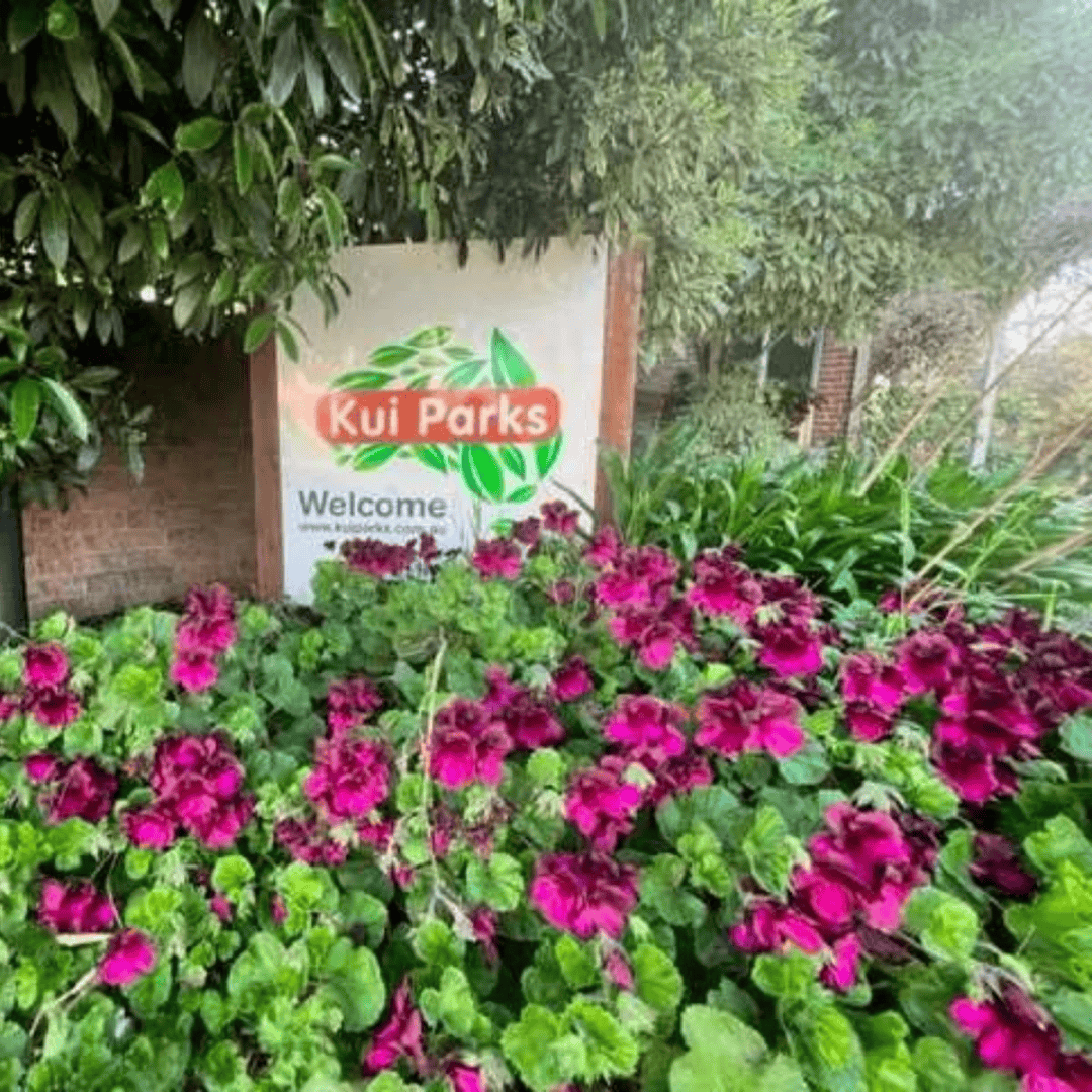 Beach park tourist caravan park kui parks sign